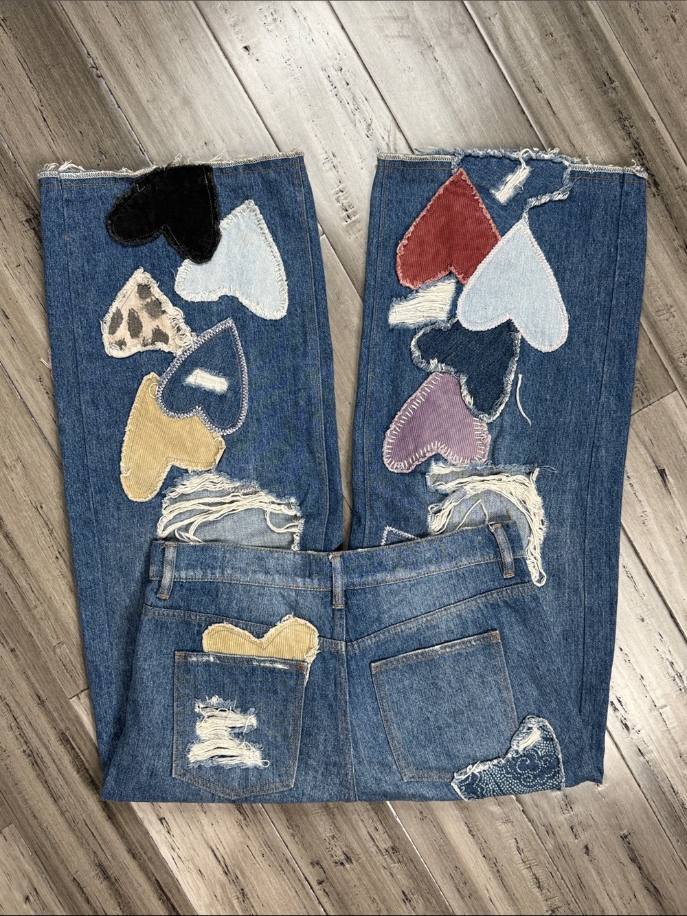 FREE PEOPLE WE THE FREE PIECE OF MY HEART PATCHWORK DISTRESSED WIDE LEG JEANS - Picture 9 of 14